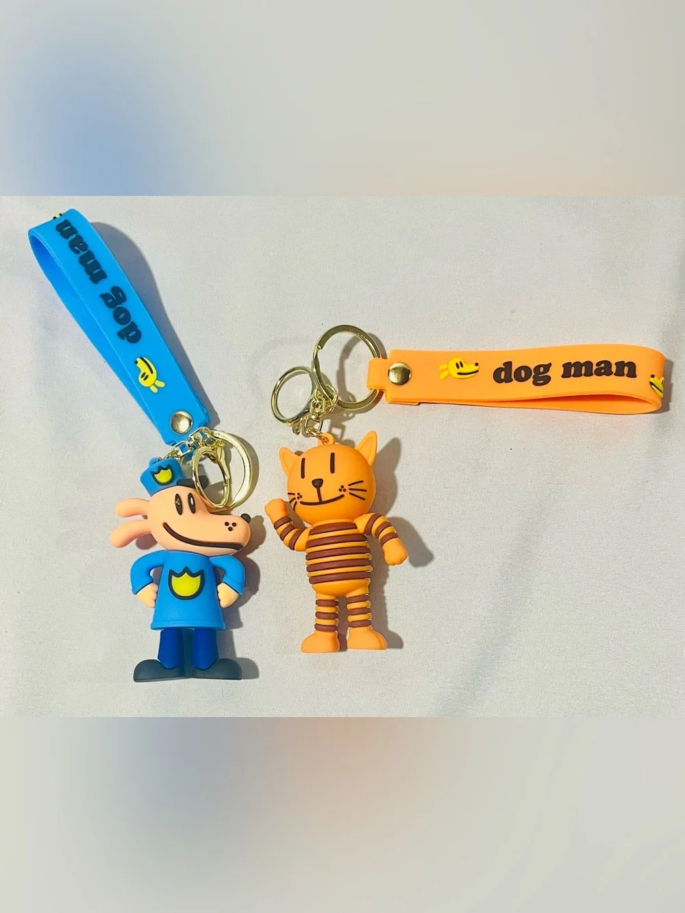 Dog Man & Cat Keychain Set with Blue and Orange Straps